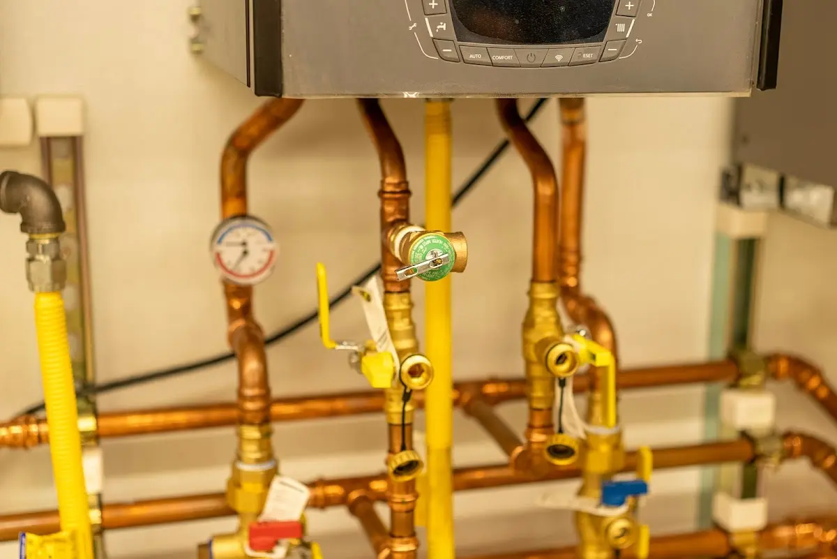 Licensed technician providing Backflow Prevention for a homeowner in Henniker